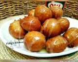 A picture of step 6 of Puff puff with condensed milk.