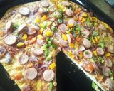 A picture of step 7 of Smokie pizza.