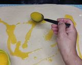 A picture of step 5 of Cinnamon rolls with nutella frosting.