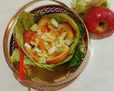 A picture of step 6 of Apple and Cabbage bowl fruit chat.