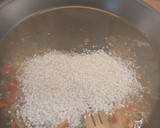 Foto del paso 8 de la receta: Arroz de gamba roja y chipirones