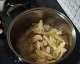 A picture of step 7 of Crispy honey chilli potato.