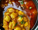 A picture of step 6 of Shahi Chhole Bhature prepared with garam masala.