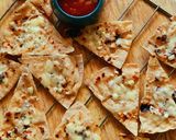 A picture of step 7 of Garlic-Cheese Roti Bites.