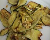 A picture of step 4 of Italian marinated zucchini with broccoli cheese pattice.