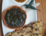 A picture of step 8 of Sarso da saag te makke Di roti with tomato chutney.