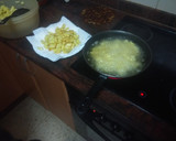 Foto del paso 4 de la receta: Chuletas de cerdo al salmorejo con papas fritas
