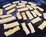 Foto del paso 7 de la receta: Bastoncitos de queso 