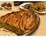 A picture of step 11 of Plantain pastelòn.