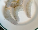 Foto del paso 7 de la receta: Troncos de calabacín rellenos de atún y langostinos