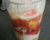 A picture of step 2 of Peaches and Cream Smoothie.