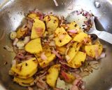 A picture of step 2 of Mogri ki subji.