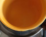 A picture of step 1 of Lemon grass masala tea.