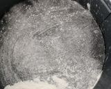 A picture of step 4 of Chocolate cake with chef's hat.