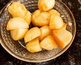A picture of step 4 of White gravy kashmiri Aloo Dum.