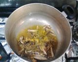 A picture of step 4 of Spaghetti jollof & torn titus smoked fished.