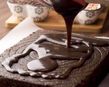A picture of step 6 of Eggless Chocolate Cake.