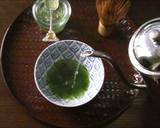 Preparing a cup of Matcha on a table recipe step 6 photo