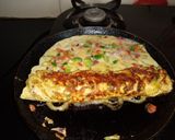 A picture of step 6 of Japeness egg rolls.