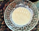 A picture of step 1 of Tomato Raita seasoned with Mustard seeds.