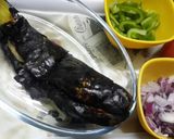 A picture of step 1 of Baingan Bharta.