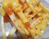 A picture of step 5 of Fries cottage with cheese.
