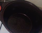 A picture of step 2 of Coconut rice.