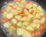 A picture of step 4 of Chicken Wing Stew with Potato.