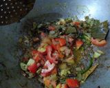 A picture of step 3 of Egg pulav.