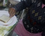 A picture of step 3 of Cheese chutney sandwich.