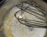 A picture of step 2 of White chocolate choco bar nuties.