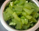 A picture of step 3 of Stir fried veggies stuffed in capsicum gravy.