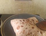 A picture of step 10 of Cheese stuffed paratha with smile emoji.