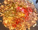 A picture of step 3 of Lebanese style spaghetti with minced meat and red sauce.