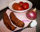 Une image de l'étape 1 de ROUGAIL SAUCISSES FUMÉES aux GROS PIMENTS (spécialité Réunionnaise).