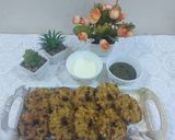 A picture of step 4 of Sabudana vada donut with sweet curd and mint chutney.