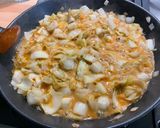 A picture of step 11 of Endive Gratin with Red Bell Peppers, Ham, Honey, and Curry.