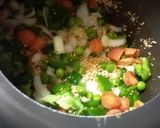 A picture of step 2 of Daliya Pulao.