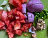 A picture of step 2 of Koli (Chicken) Saaru (runny curry)- Karnataka style.