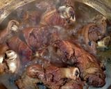 A picture of step 1 of Braised Pork Leg in Five-Spice Sauce.