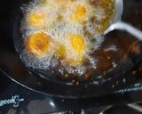 A picture of step 7 of Chatpata naan with aloo tikki wrap.