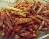 A picture of step 2 of Loaded fajita fries.