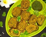 A picture of step 10 of Authentic Rickwach with Urad Dal and Colocasia leaves.