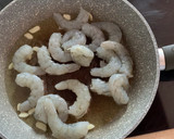 Foto del paso 8 de la receta: Arroz basmati con panceta y langostinos