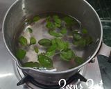 A picture of step 2 of Fresh Tulsi Leaves Tea.