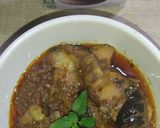 A picture of step 6 of Masala Baingan Aloo.