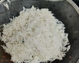 A picture of step 1 of Carrot Tomato Rice.