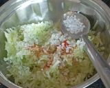 A picture of step 2 of Cucumber,Mint and Lemon grass Koshimbir with Tulsi leaves.