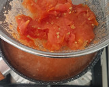 A picture of step 1 of Tomato Soup with Bread.