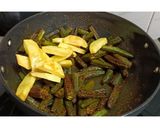 A picture of step 2 of Dry bhindi aloo sabzi without onion and ginger garlic.